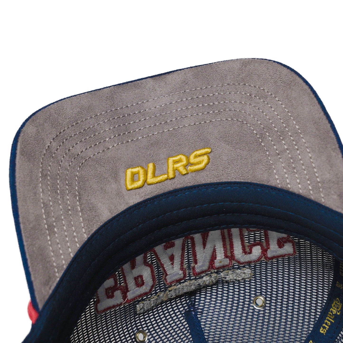 Underbrim detail of the France trucker hat — The Hat Dealers — grey suede underbrim with gold DLRS embroidery