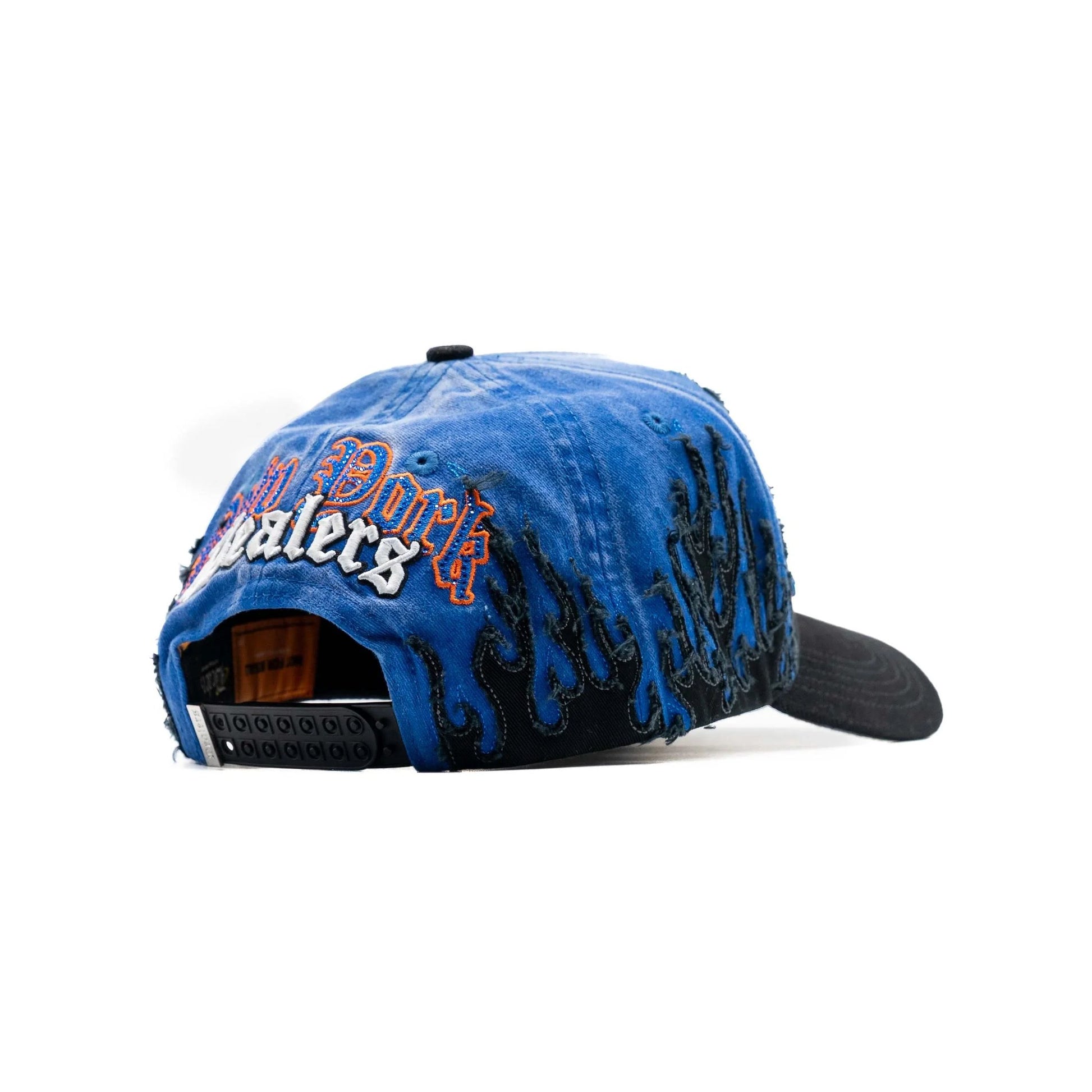 Blue distressed snapback hat with black flame embroidery and bold New York Dealers text
