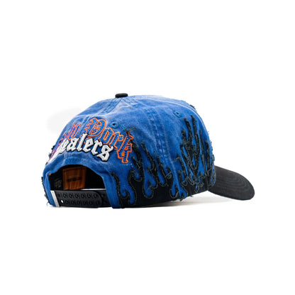 Blue distressed snapback hat with black flame embroidery and bold New York Dealers text