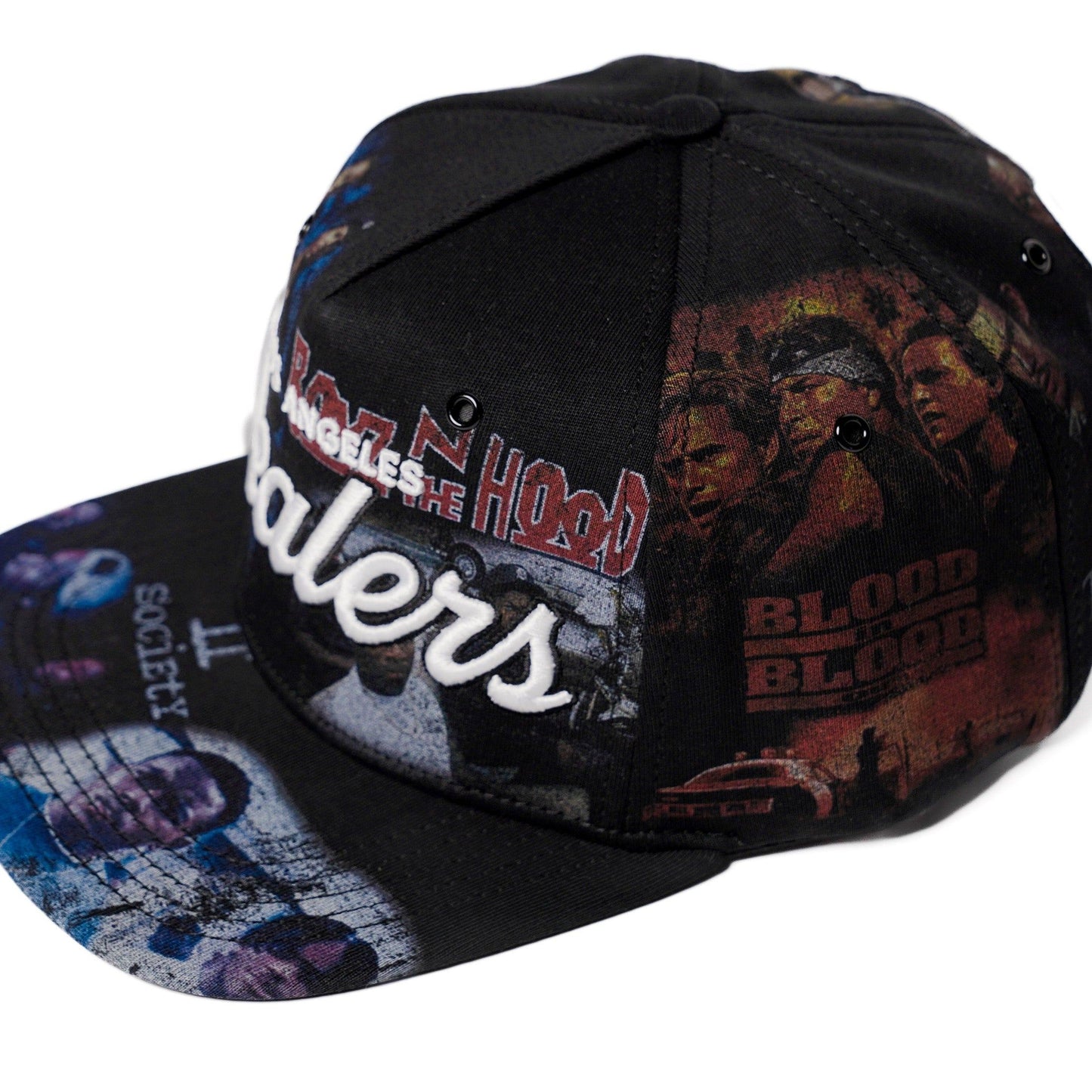 The Classics LA movie-collage snapback, flat brim — front three-quarter angle