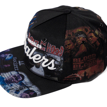 The Classics LA movie-collage snapback, flat brim — front three-quarter angle