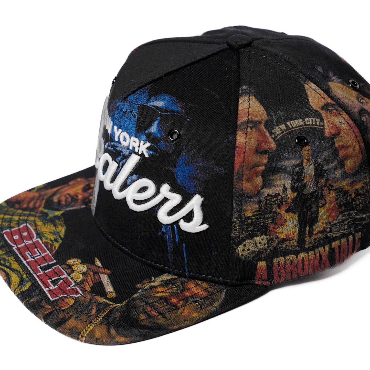 The Classics NY movie-collage snapback, flat brim — front angle with brim print