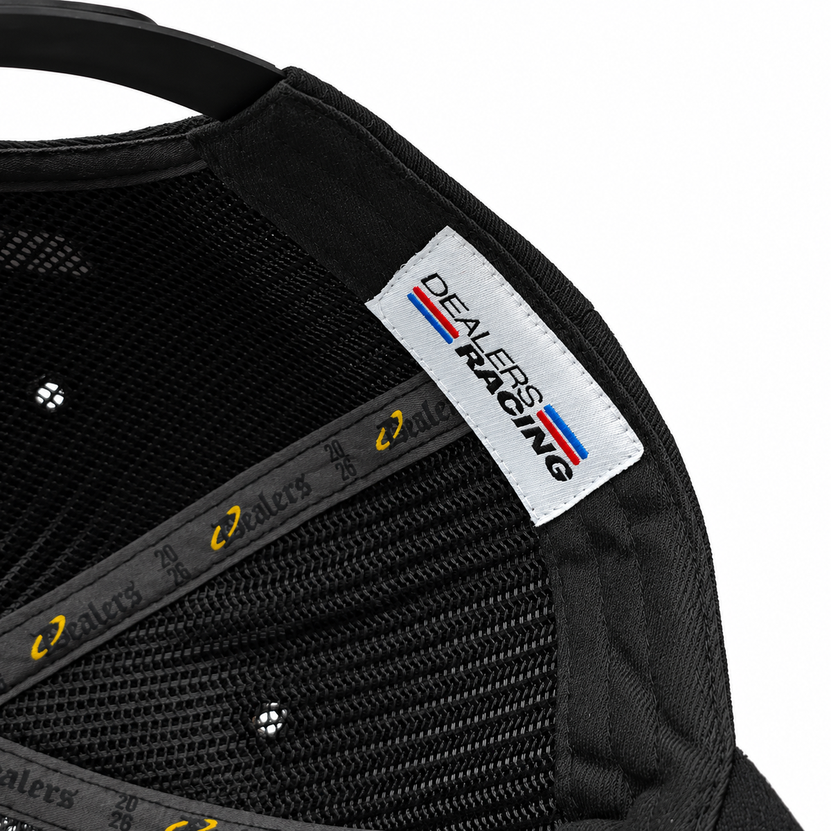 Inside the Dealers Racing Reflective snapback — black mesh lining, Dealers 2026 taping and DEALERS RACING woven label