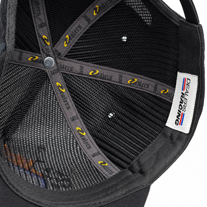 Inside the crown of the Dealers Racing Reflective snapback — printed seam taping and woven label