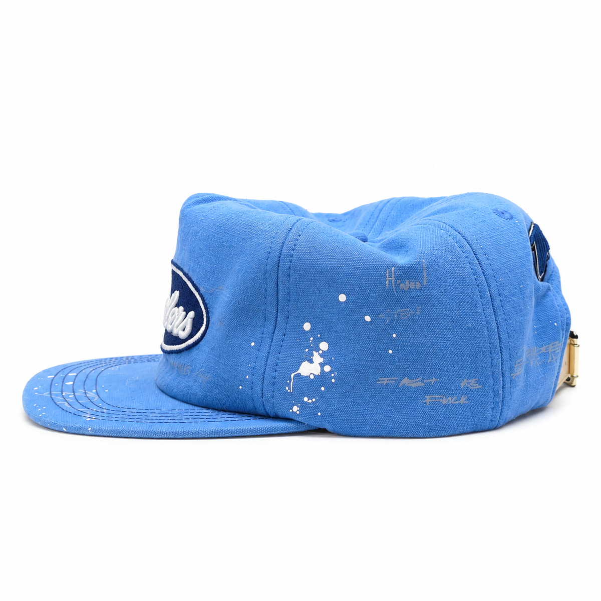 Dealers Unstructured Racing cap, side view with silver signature marks and the leather strap