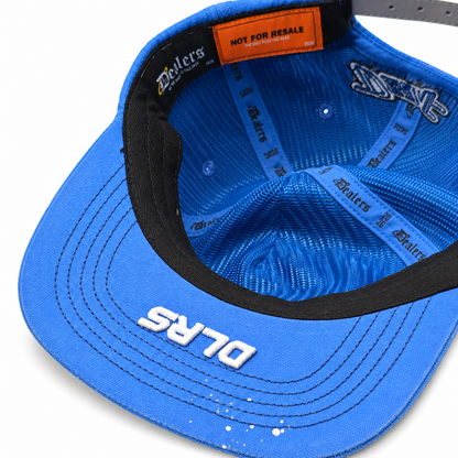 Under the brim of the Dealers Unstructured Racing cap — white DLRS embroidery and contrast stitching