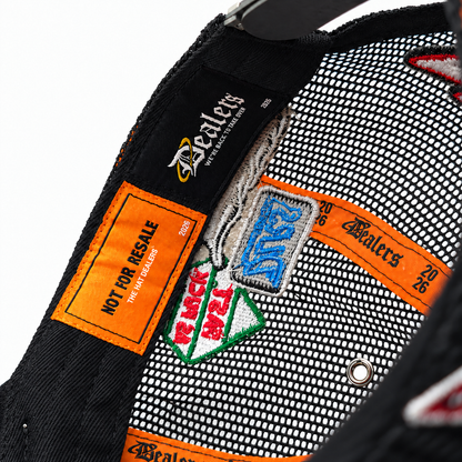Inside the Fast Life Racing Trucker — NOT FOR RESALE and Dealers labels with orange Dealers 2026 taping