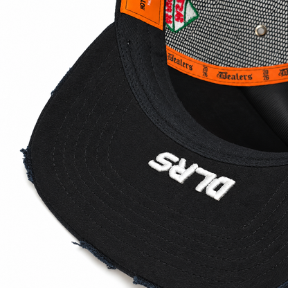 Under the brim of the Fast Life Racing Trucker — white DLRS embroidery and frayed edge
