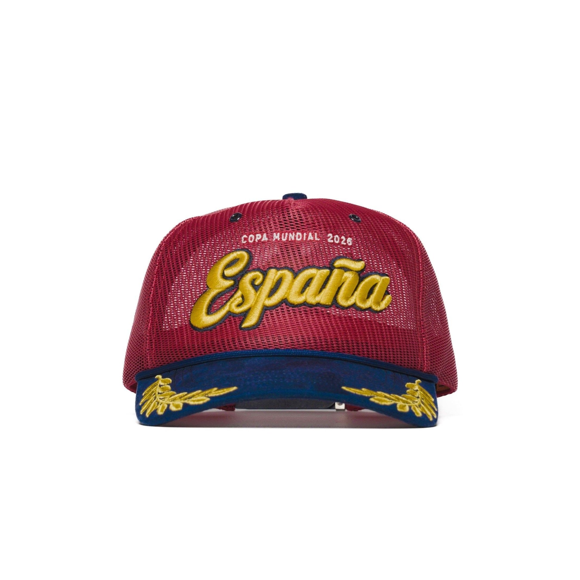 Front view of Spain trucker hat — The Hat Dealers — red mesh trucker with gold 'España' script embroidery and navy laurel brim