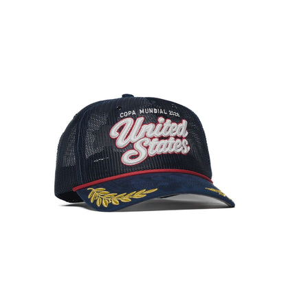 Angle view of USA trucker hat — The Hat Dealers — navy mesh trucker cap with gold laurel brim embroidery