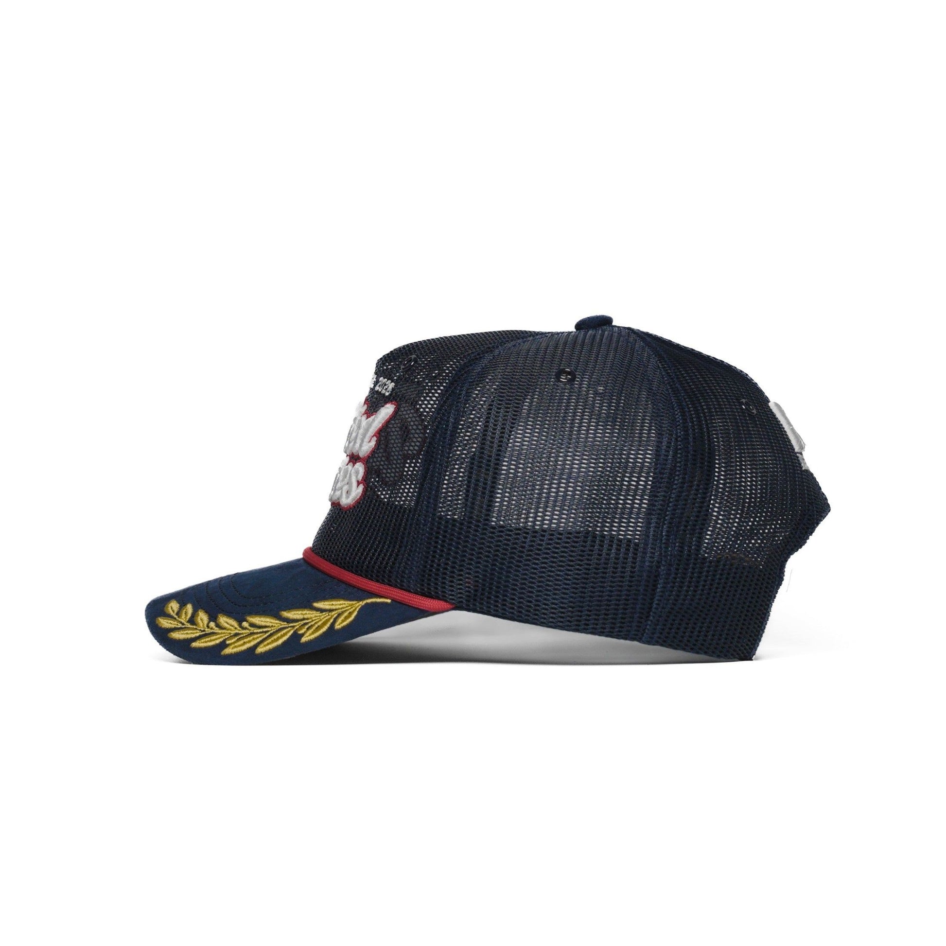 Left side view of USA trucker hat — The Hat Dealers — navy mesh trucker with gold laurel-branch brim embroidery