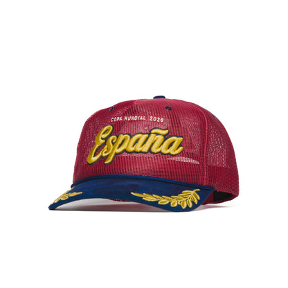 Front three-quarter angle of Spain trucker hat — The Hat Dealers — gold script front and gold laurel navy brim
