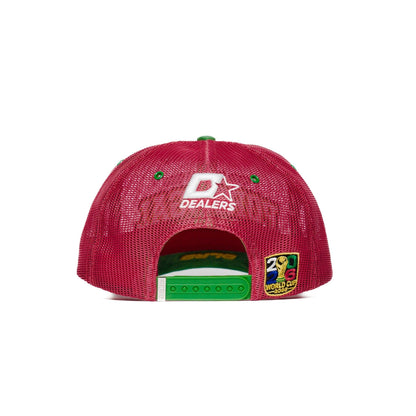 Back view of Portugal trucker hat with white Dealers star logo, green snap closure and gold patch — The Hat Dealers