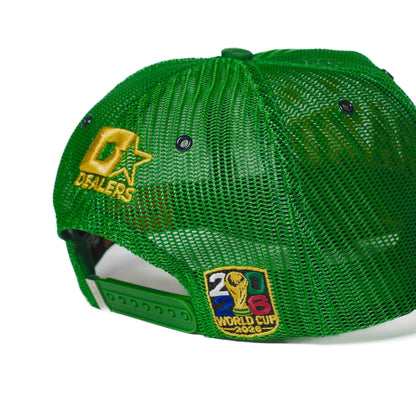 Back detail of the Brazil trucker hat — The Hat Dealers — close-up of gold Dealers embroidery and woven patch