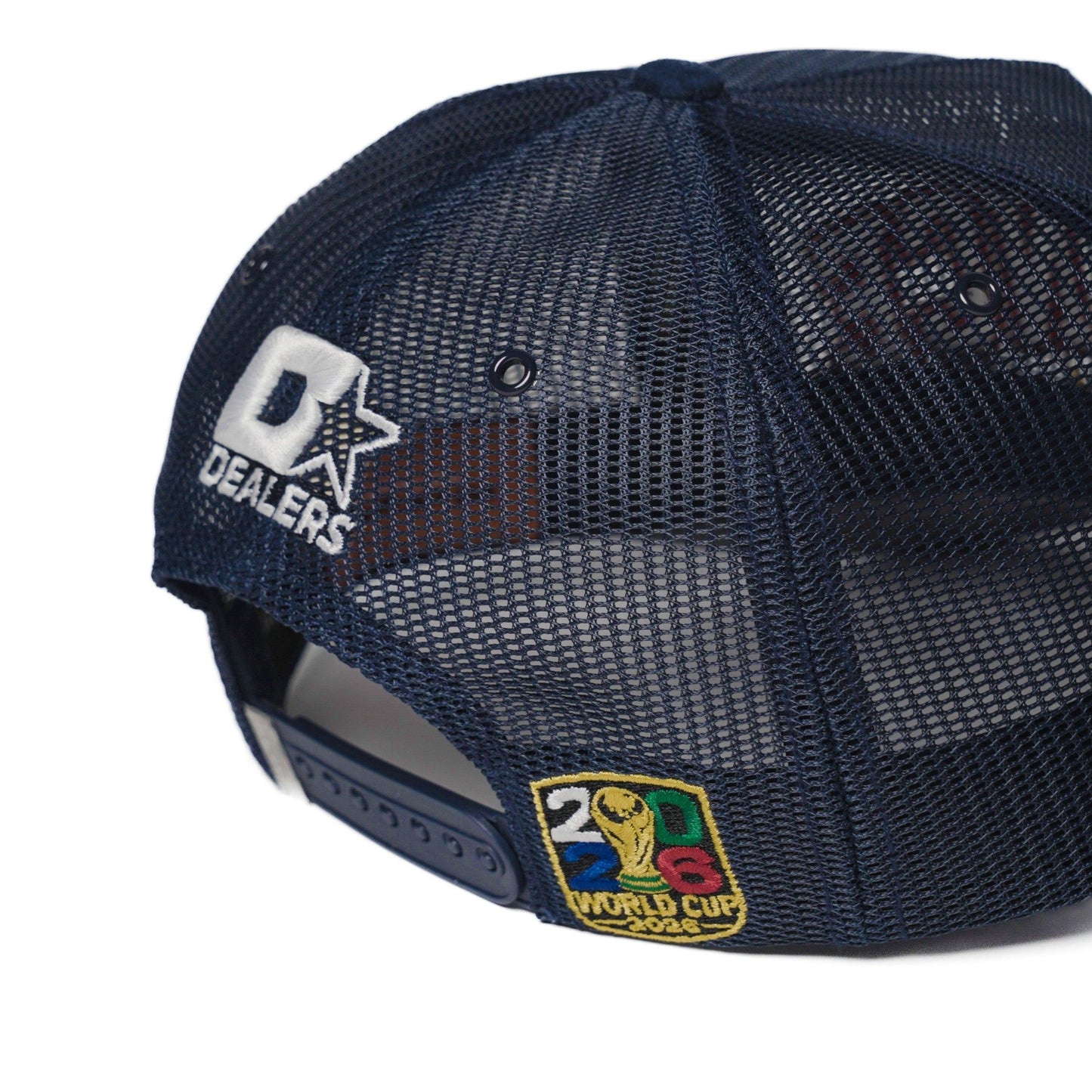 Back detail of the France trucker hat — The Hat Dealers — close-up of the Dealers star logo on navy mesh