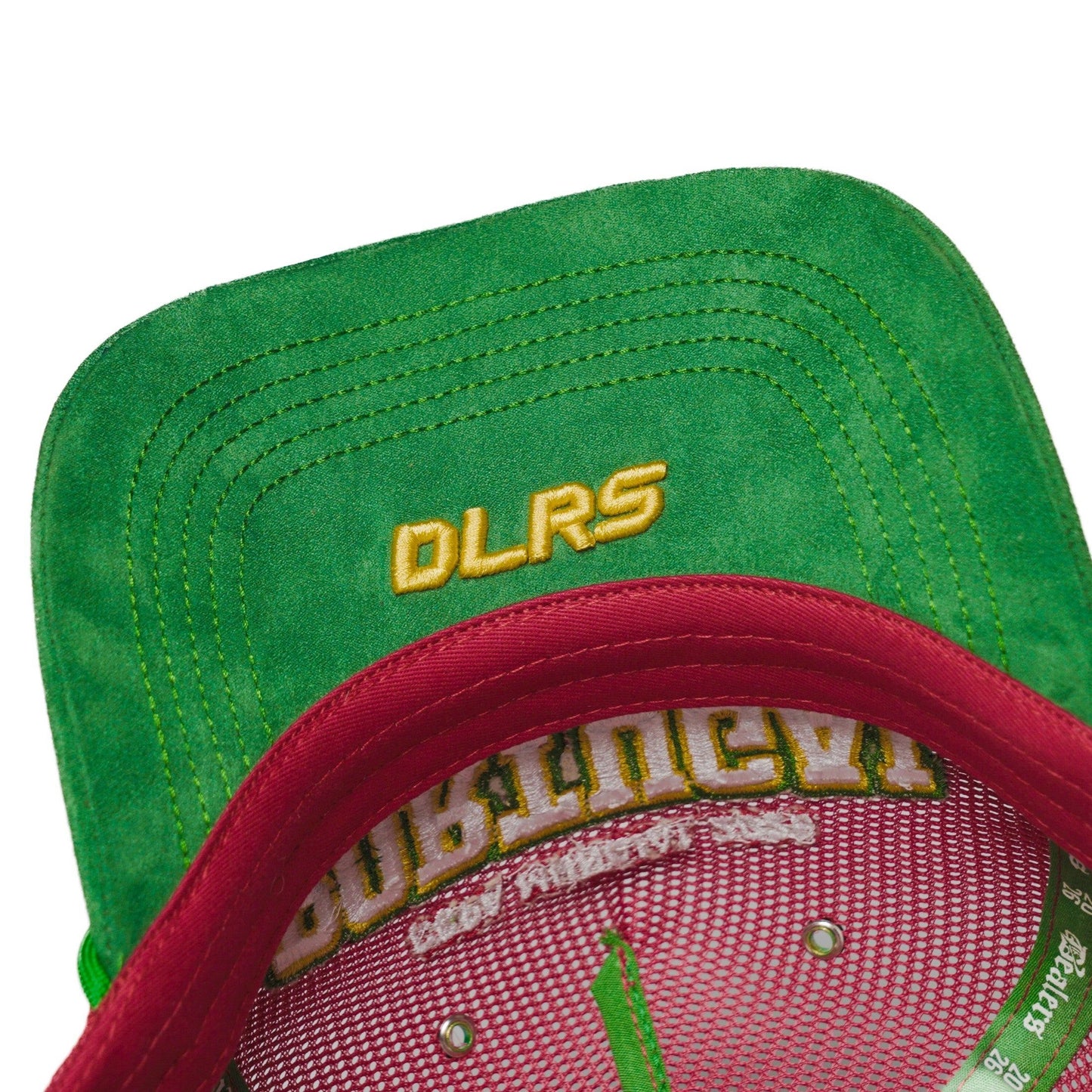 Underbrim detail of Portugal trucker hat showing green brim with gold DLRS embroidery — The Hat Dealers