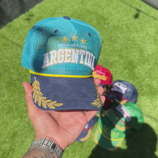 Argentina trucker hat - in-hand close-up