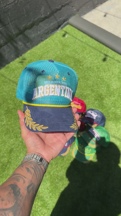 Argentina trucker hat - in-hand close-up