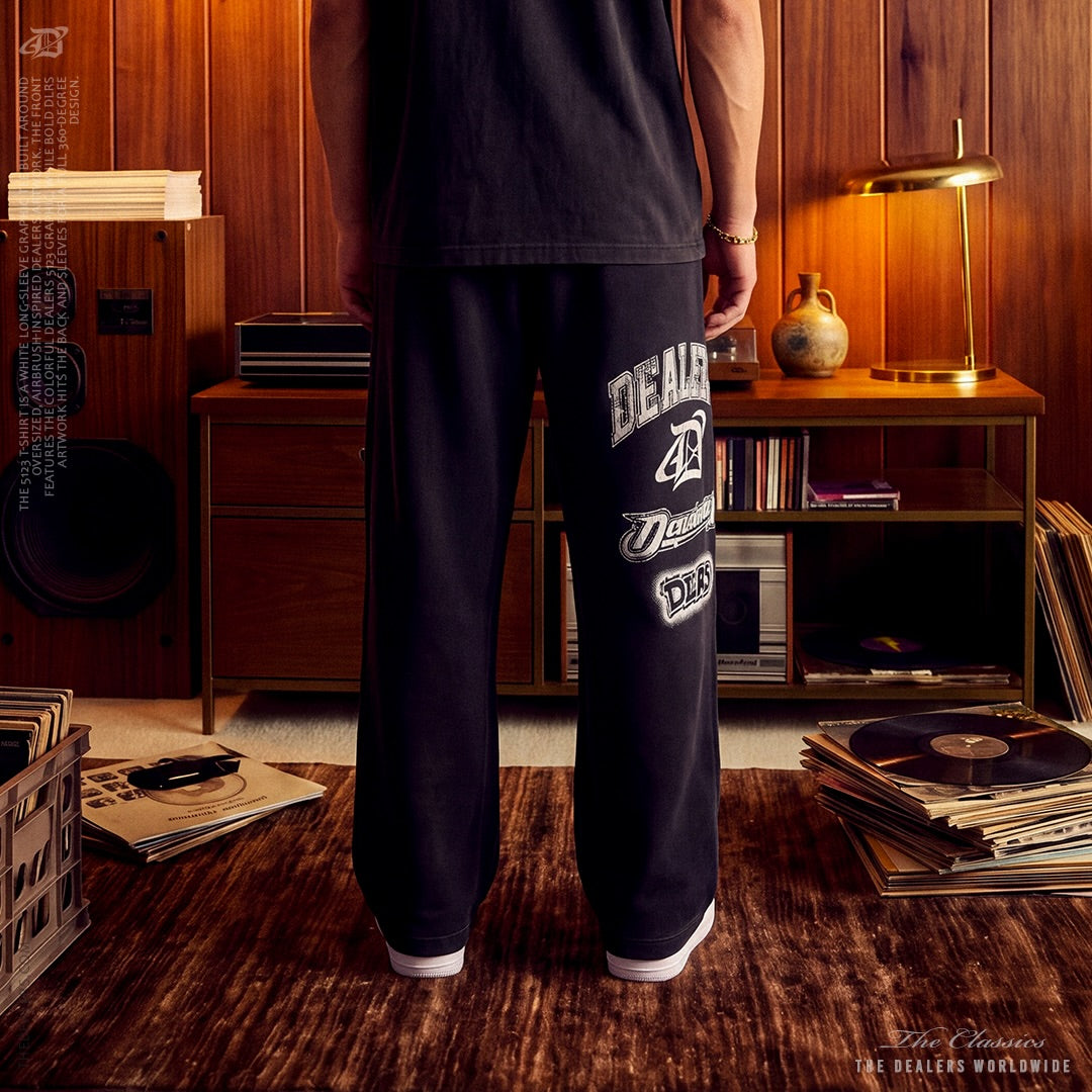 Dealers Sweatpant worn, back view with the leg graphics